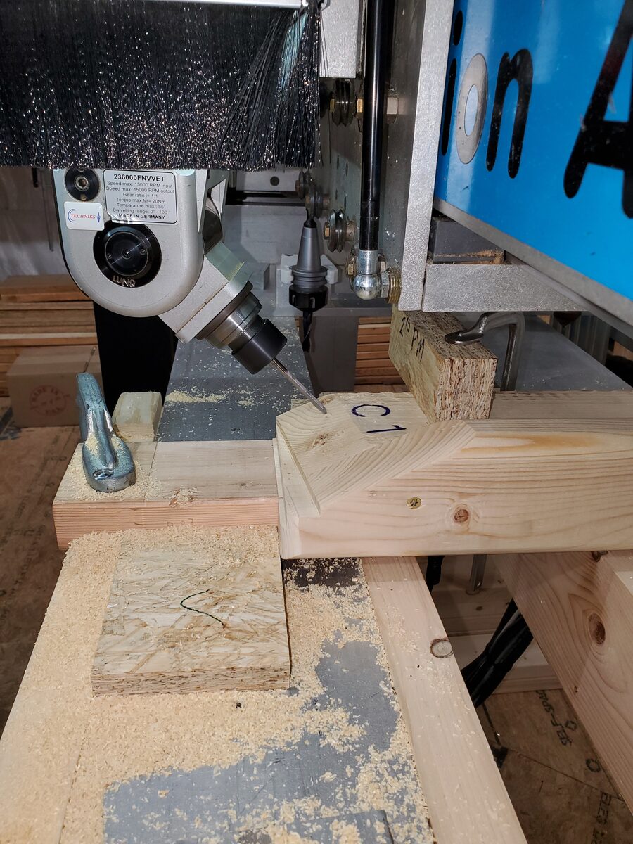 Angled drilling on a CNC-machined timber part